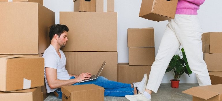 The Ultimate Moving Checklist for Relocating to Cincinnati 2 A couple is preparing for relocation by following the ultimate moving checklist.