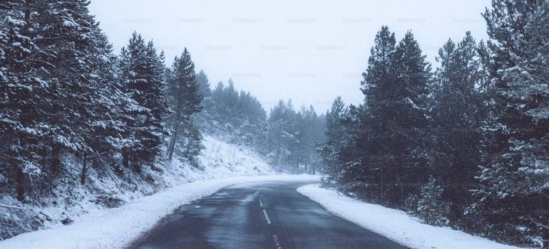 When Is the Best Season to Move in Maineville Ohio? 2 A road with snow on the side which can be an obstacle when considering the best season to move in Maineville Ohio