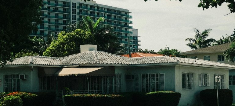 Why Are Families Moving To West Chester Ohio? 2 Suburban House with Modern High-rise in Background