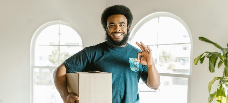 Is Lebanon Ohio a Nice Place to Live? 4 Reliable movers carefully transporting household items during a residential move.