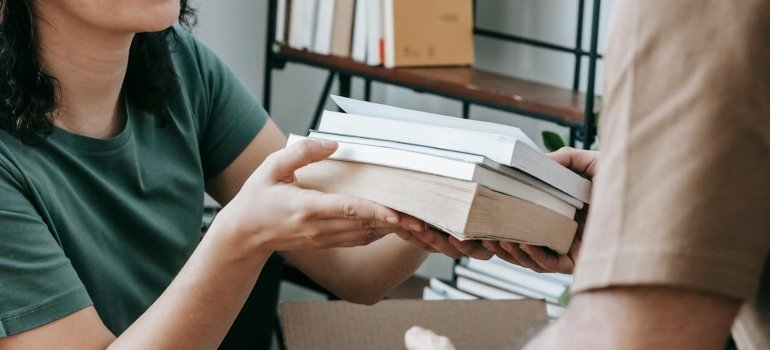 The Best Way to Pack Books for Moving 4 couple planning to sell or donate books