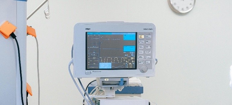 How to Move with Medical Equipment: Tips for Patients and Caregivers 2 An electronic medical device with display