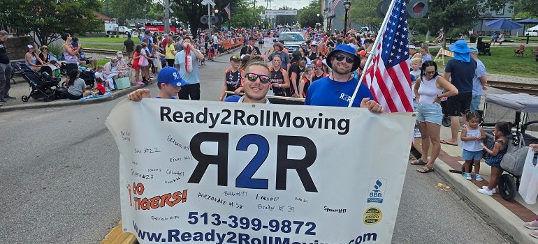 Hamilton Movers 5 workers from a hamilton ohio moving company celebrating after a successful move