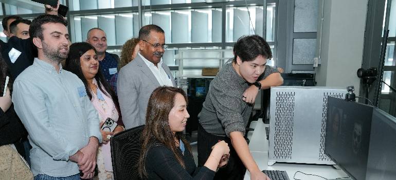 Essential corporate relocation guide for Fairfield OH companies 3 a man training staff using corporate relocation guide for Fairfield OH