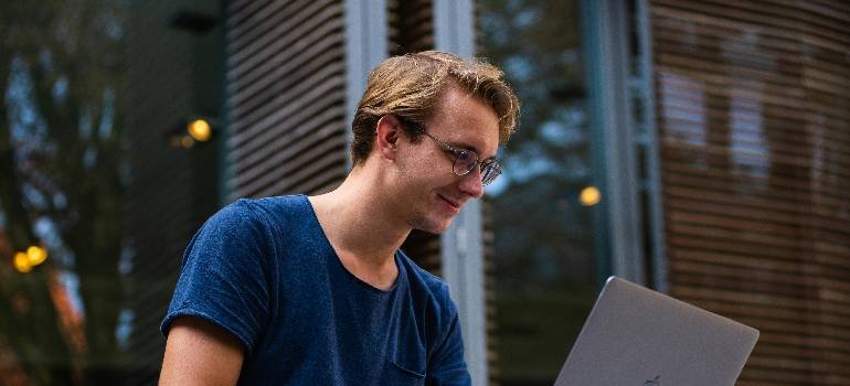 Top places in the Greater Cincinnati metro area for young professionals 5 a man sitting in one of the places in the Greater Cincinnati metro area for young professionals