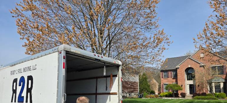 The ultimate guide for a spring move to Harrison OH 8 Moving truck outside window during spring move to Harrison OH