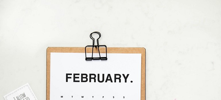 Maximizing daylight during your February move: Tips for a smooth transition 1 a wall calendar turned ti February