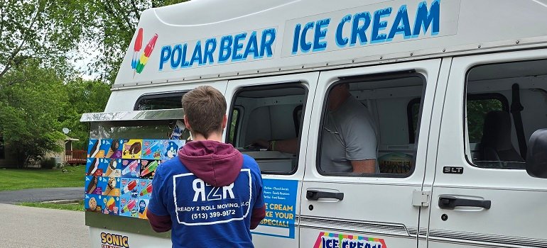 Moving during the school year in Cincinnati: Checklist for parents 6 Ready2Roll mover grabbing ice cream on break