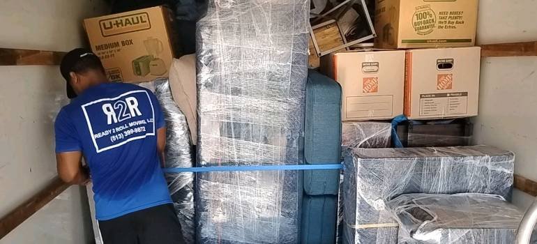 Essential precautions to take when moving to Cincinnati 3 Wrapped furniture of people who know about recautions to take when moving to Cincinnati