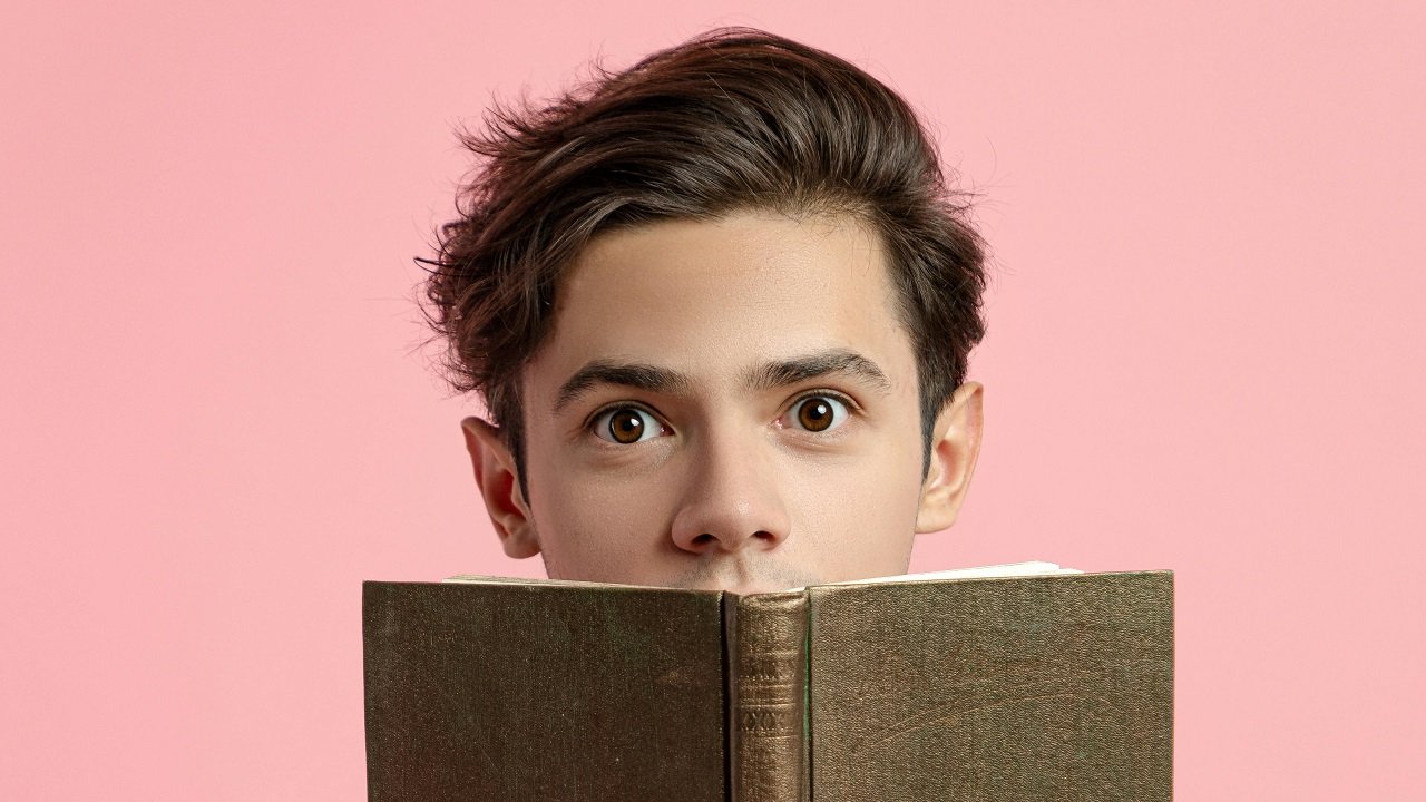 a young man reading about interesting facts about Maineville Ohio
